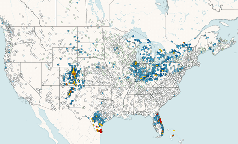 Graph: Map of the United States overlaid with a precipitation scatter plot from CoCoRaHS