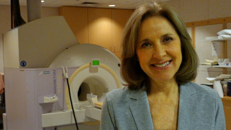 Dr. Fisher with an fMRI brain scanner