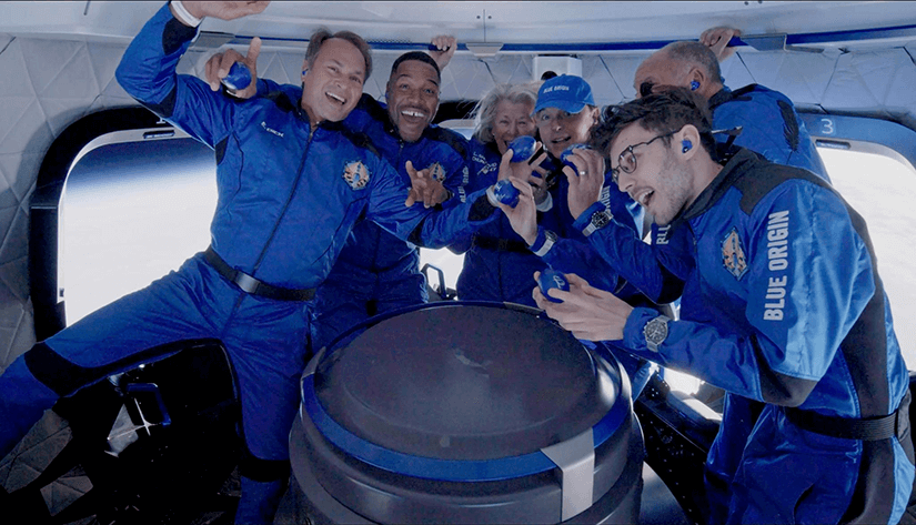 The NS-19 crew poses for a photo while enjoying zero G as they reach apogee.