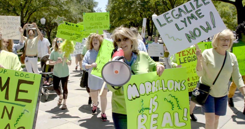 A still from the documentary 'Skin Deep: The Battle Over Morgellons' that shows women protesting about the disease