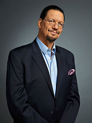 Penn Jillette wearing a black suit