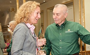 Dave Remine presents Rena Subotnik the 2013 Mensa Foundation Lifetime Achievement Award