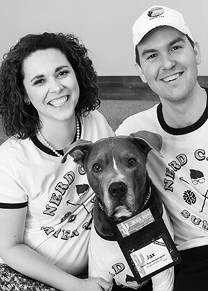 Henri Buccine-Schraeder, her husband Jordan Weiss, and their dog, Jax.