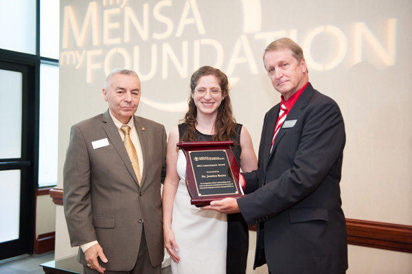 Eldon Romney and Dave Remine present Dr. Jessica Reyes with the inaugural Laura Joyner award