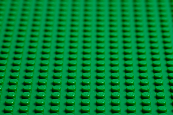 A green LEGO baseplate